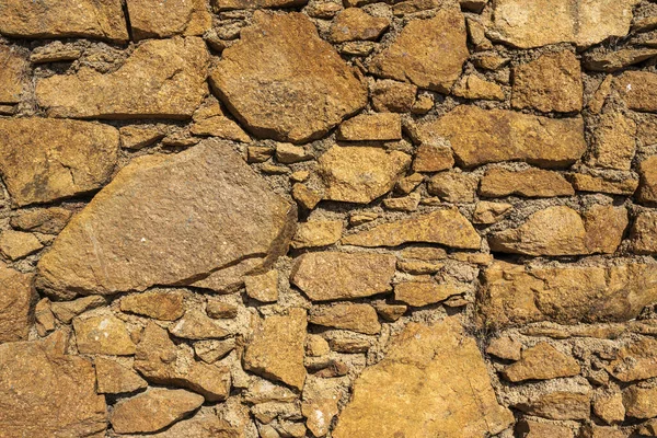 作为背景或纹理的天然石墙的碎片 石墙的结构 古堡石墙纹理背景 砌体背景 — 图库照片