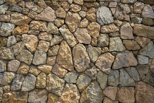 背景や質感としての天然石の壁の断片 石の壁の構造について 古い城の石の壁の質の背景 メイソンリー — ストック写真