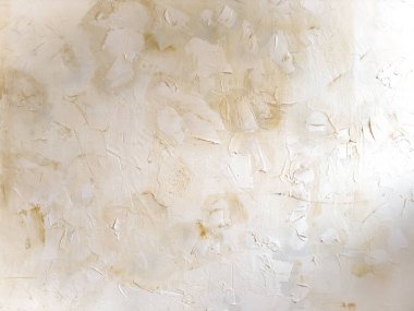 Eski taş duvarın pürüzlü yüzeyinin desenli arka planı çatlaklarla dolu.