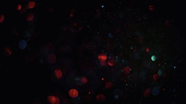 Bokeh geçmişi. Koyu kırmızı altın sihirli noel arkaplanı.