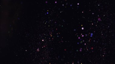 Bokeh geçmişi. Koyu kırmızı altın sihirli noel arkaplanı.