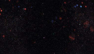 Bokeh geçmişi. Koyu kırmızı altın sihirli noel arkaplanı.