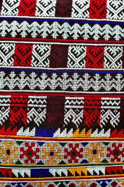 El işlemesi Yao Mien renkli desenli nakış, geleneksel kabile tekstili, karmaşık dikiş, arka plan, tasarım ve kültürel sanat projeleri için mükemmel..
