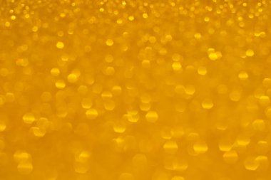 Altın bokeh arkaplan, parlak bokeh ışık efekti, soyut arkaplan.