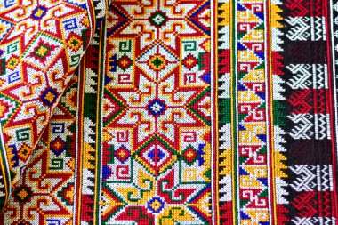 El işlemesi Yao Mien renkli desenli nakış, geleneksel kabile tekstili, karmaşık dikiş, arka plan, tasarım ve kültürel sanat projeleri için mükemmel..