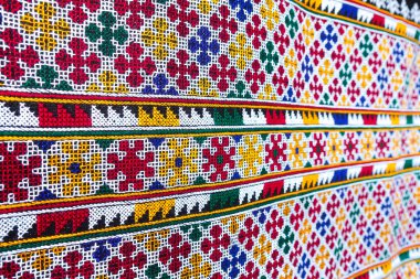 El işlemesi Yao Mien renkli desenli nakış, geleneksel kabile tekstili, karmaşık dikiş, arka plan, tasarım ve kültürel sanat projeleri için mükemmel..