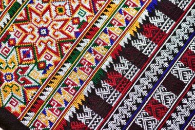 El işlemesi Yao Mien renkli desenli nakış, geleneksel kabile tekstili, karmaşık dikiş, arka plan, tasarım ve kültürel sanat projeleri için mükemmel..