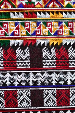 El işlemesi Yao Mien renkli desenli nakış, geleneksel kabile tekstili, karmaşık dikiş, arka plan, tasarım ve kültürel sanat projeleri için mükemmel..