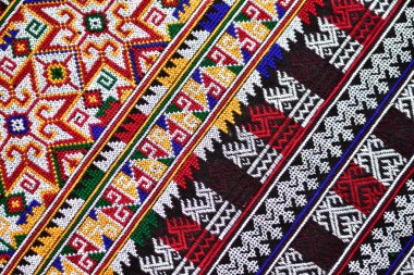 El işlemesi Yao Mien renkli desenli nakış, geleneksel kabile tekstili, karmaşık dikiş, arka plan, tasarım ve kültürel sanat projeleri için mükemmel..