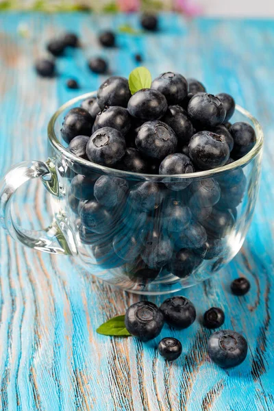Fresh Blueberries Glass Cup Blue Wooden Background — Stock Photo, Image