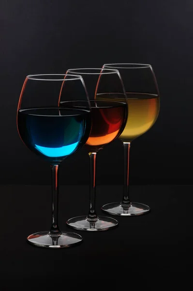 Три Склянки Спеціальних Напоїв Чорному Фоні — стокове фото