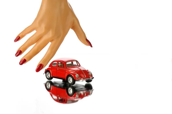 Vrouw Hand Proberen Houden Speelgoed Rood Auto — Stockfoto