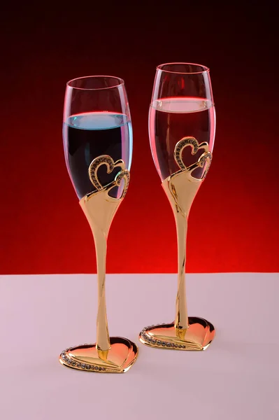 Two Glasses Champagne Glass Red Wine Red Background — Stock Photo, Image