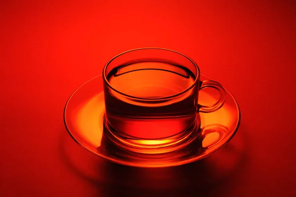Tasse Roter Tee Mit Orange Auf Holztisch Nahaufnahme — Stockfoto