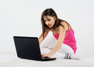 young beautiful woman with a laptop on a white background