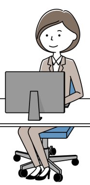 Takım elbiseli bir kadın bilgisayar kullanıyor. Bilgisayar kullanan takım elbiseli bir kadının resmi..