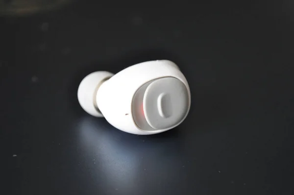 Headphones Black Surface — Stock Photo, Image