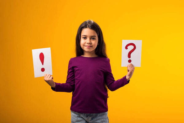 Portrait Smiling Kid Girl Holding Cards Question Mark Exclamation Point Stock Photo