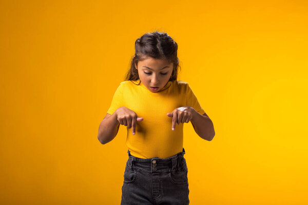 Portrait Child Girl Pointing Fingers Yellow Background Children Emotions Advertisement Stock Picture