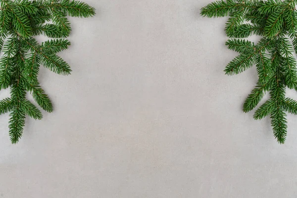 モミの枝の装飾的なフレーム テキスト用のコピースペースとクリスマス休暇の背景 フラットレイアウト トップビュー — ストック写真