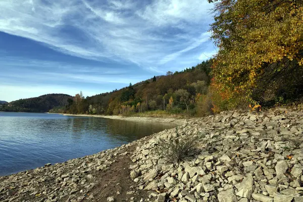154 / 5 Wyniki tumaczeniaTumaczenieAutumn view of the Klimkwka Resvoir on the Ropa River in Low Beskids