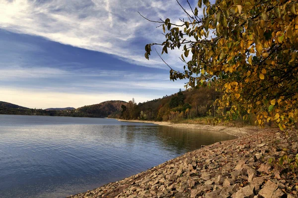 154 / 5 Wyniki tumaczeniaTumaczenieAutumn view of the Klimkwka Resvoir on the Ropa River in Low Beskids