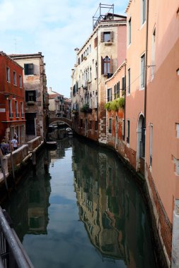 Venice canals and charming alleys are a paradise for touristsThe city on the water surprises with its beauty and Venetian atmosphere clipart