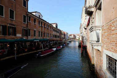 Venice canals and charming alleys are a paradise for touristsThe city on the water surprises with its beauty and Venetian atmosphere clipart