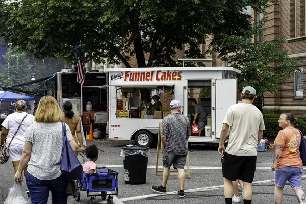 stock image Chambersburg Pennsylvania USA 7-20-2024 food truck serving funnel cakes at outdoor festival