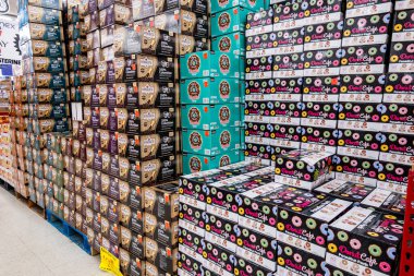 Chambersburg, Pennsylvania, USA 8-27-2024 large display of boxes filled with coffee pods stacked to ceiling at ollies bargain outlet clipart