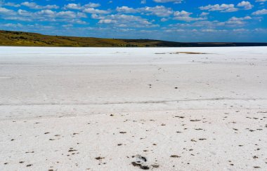 Salt desert - drying Kuyalnitsky estuary. White table salt at the bottom of a dried-up reservoir, Ukraine