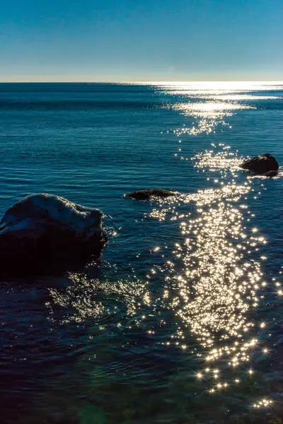 Reflection of the sun in the water in the Black sea, Odessa