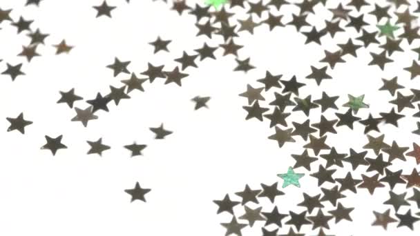 坠落的星星为过渡 小金星数量众多 覆盖在白色的发光屏幕上 然后消失在风流中 — 图库视频影像