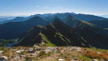 Panorama of Majestic Green alps mountains in sunny morning summer. Ideal as tourism hiking Outdoor Background