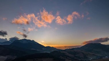 Aerial view of Evening sky after sunset in countryside nature landscape background. Hyper Time lapse