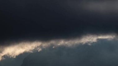 Time lapse of dramatic clouds motion fast in winter alps mountains nature landscape with reveal in the end of clip, Misty natural scenery. Timelapse, Slow zoom in