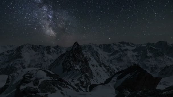 Milky Way Galaxy Starry Night Sky Moving Snowy Alpine Mountains — Stock Video