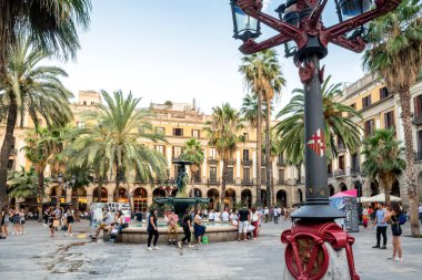 Barcelona, Spain - July 6, 2017: day view of Placa Real famous square in Barcelona, Spain.