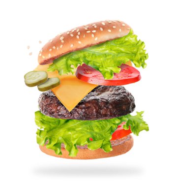 Uçan büyük hamburger beyaz zemin üzerinde izole