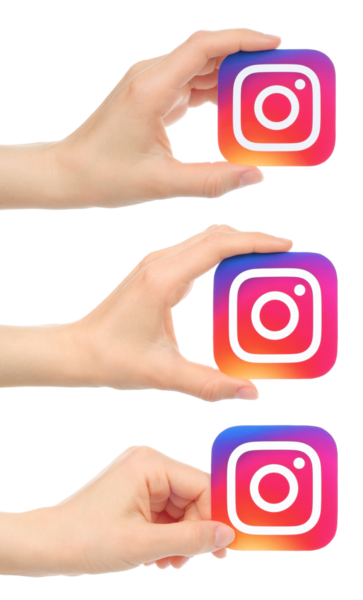 Kyiv, Ukrayna - 9 Eylül 2024: Kağıt Instagram simgesi taşıyan eller seti, şeffaf arkaplanda izole edilmiştir. Instagram bir fotoğraf ve video paylaşım sosyal ağ hizmetidir.