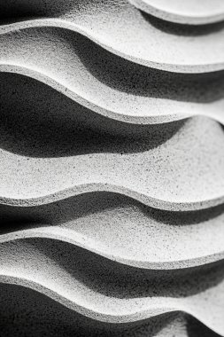 Siyah beyaz dalgalı çizgilerin soyut deseni.