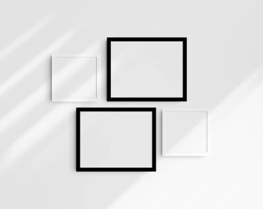 Galeri duvarı modelleme seti, 4 siyah beyaz çerçeve. Temiz, modern ve minimalist çerçeve modeli. İki yatay çerçeve ve iki kare çerçeve, 14x11 (14: 11), 8x8 (1: 1) inç, gölgeli beyaz bir duvar üzerinde.