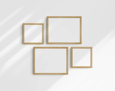 Galeri duvarı modelleme seti, 4 kereste meşe ağacı çerçevesi. Temiz, modern ve minimalist çerçeve modeli. İki yatay çerçeve ve iki kare çerçeve, 14x11 (14: 11), 8x8 (1: 1) inç, gölgeli beyaz bir duvar üzerinde.