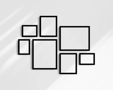 Galeri duvarı modelleme seti, 7 siyah çerçeve. Temiz, modern ve minimalist çerçeve modeli. Üç yatay çerçeve ve dört dikey çerçeve, 5x7 (5: 7), 7x5 (7: 5), 8x10 (4: 5), 12x15 (4: 5), 15x12 (5: 4) inç, gölgeli beyaz bir duvar üzerinde.