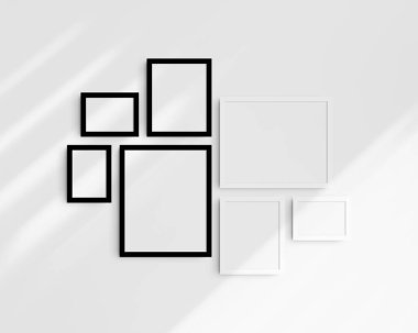 Galeri duvarı modelleme seti, 7 tane siyah beyaz çerçeve. Temiz, modern ve minimalist çerçeve modeli. Üç yatay çerçeve ve dört dikey çerçeve, 5x7 (5: 7), 7x5 (7: 5), 8x10 (4: 5), 12x15 (4: 5), 15x12 (5: 4) inç, gölgeli beyaz bir duvar üzerinde.