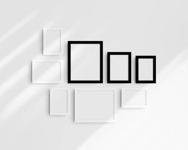 Galeri duvarı modelleme seti, 8 tane siyah beyaz çerçeve. Temiz, modern ve minimalist çerçeve modeli. Beş dikey çerçeve ve üç yatay çerçeve, 4x6 (2: 3), 6x4 (3: 2), 5x7 (5: 7), 7x5 (7: 5), 8x10 (4: 5), 10x8 (5: 4) inç, gölgeli beyaz bir duvar üzerinde.