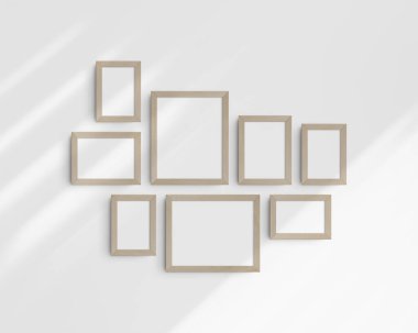 Galeri duvarı modelleme seti, 8 huş ağacı ahşap çerçeve. Temiz, modern ve minimalist çerçeve modeli. Beş dikey çerçeve ve üç yatay çerçeve, 4x6 (2: 3), 6x4 (3: 2), 5x7 (5: 7), 7x5 (7: 5), 8x10 (4: 5), 10x8 (5: 4) inç, gölgeli beyaz bir duvar üzerinde.