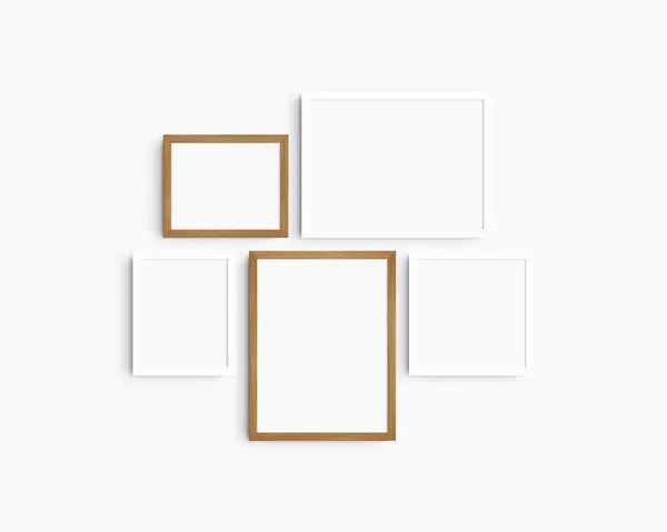 Gallery wall mockup set, 5 white and cherry wood frames. Clean, modern, minimalist frame mockup. Two horizontal frames, two vertical frames, and a square frame, 12x16 (3:4), 16x12 (4:3), 8x10 (4:5), 10x8 (5:4), 10x10 (1:1) inches, on a white wall.
