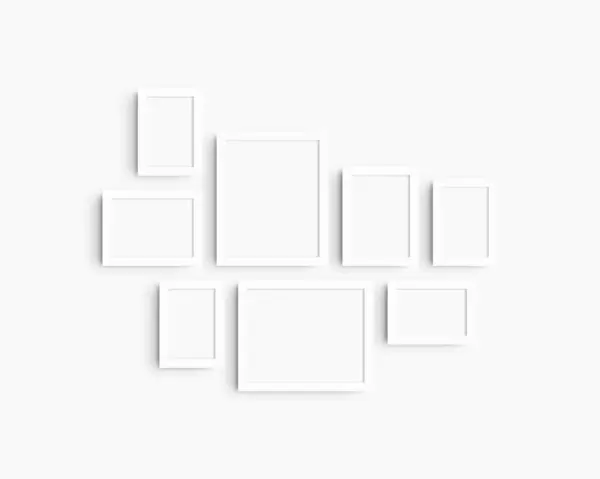 画廊墙壁模型设置 8个白色框架 简约的框架模型 白墙上的5个垂直框架和3个水平框架 4X6 6X4 5X7 7X5 8X10 10X8 免版税图库图片