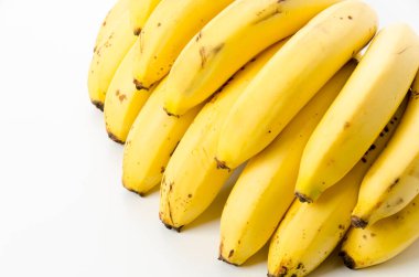 beyaz zemin üzerine sarı muz demet